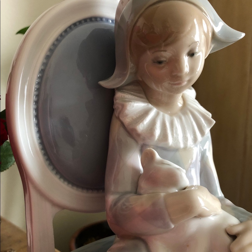 Lladro Spanish Porcelain young harlequin and cat.